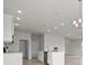 Bright kitchen features an island and stainless steel appliances at 3019 Tackle Dr, Leesburg, FL 34748