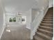 Spacious living area with carpet flooring and plenty of natural light at 3019 Tackle Dr, Leesburg, FL 34748