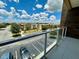 View from balcony overlooking parking lot and residential buildings at 3185 Brasilia Ave, Kissimmee, FL 34747