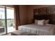 Bright bedroom with two twin beds and balcony access at 3185 Brasilia Ave, Kissimmee, FL 34747