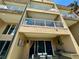 Three-story building with private balconies and outdoor kitchen at 3185 Brasilia Ave, Kissimmee, FL 34747