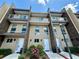 Modern townhome community with three-story buildings and private entrances at 3185 Brasilia Ave, Kissimmee, FL 34747