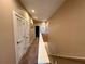 Upstairs hallway with access to bedrooms and closets at 3185 Brasilia Ave, Kissimmee, FL 34747