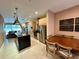 Modern kitchen with stainless steel appliances and dark granite countertops at 3185 Brasilia Ave, Kissimmee, FL 34747