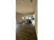 Open concept kitchen with granite countertops and gray cabinetry at 322 N 6Th St, Haines City, FL 33844