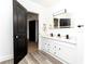 Modern bathroom with double vanity and hexagon tile shower at 3452 Old Tampa Hwy, Lakeland, FL 33811