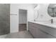 Double vanity bathroom with a view of bedroom and shower at 6264 Sw 144Th Pl, Ocala, FL 34473