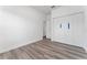 Bright bedroom with wood-look floors and spacious closet at 6264 Sw 144Th Pl, Ocala, FL 34473