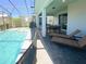 Relaxing patio area with pool and spa at 8956 Zurich Ln, Kissimmee, FL 34747