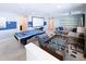Game room with pool table and foosball at 8956 Zurich Ln, Kissimmee, FL 34747