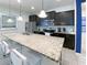 Modern kitchen with stainless steel appliances and granite countertops at 8956 Zurich Ln, Kissimmee, FL 34747