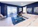 Spacious living room with white sectional sofa and glass coffee table at 8956 Zurich Ln, Kissimmee, FL 34747