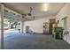 Garage with open door, showing street view at 1067 Wickerwood St, Ocoee, FL 34761