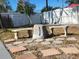 Charming backyard with stone benches and a shed at 1174 Bryn Mawr Dr, Daytona Beach, FL 32114