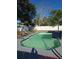 Inviting kidney-shaped pool with a gray concrete deck at 1174 Bryn Mawr Dr, Daytona Beach, FL 32114