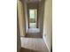 Light hallway with wood-look flooring leading to other rooms at 1409 39Th St, Orlando, FL 32839