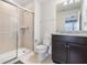 Bathroom with shower, toilet and vanity at 1627 Kona Ln, Davenport, FL 33897