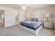 Bright bedroom with a comfortable bed and en-suite bathroom at 1627 Kona Ln, Davenport, FL 33897
