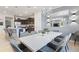 Spacious dining room with large table and modern chairs at 1627 Kona Ln, Davenport, FL 33897