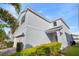 Two-story house with attached garage and landscaped front yard at 1627 Kona Ln, Davenport, FL 33897