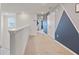 Upstairs hallway with carpet and modern paint at 1627 Kona Ln, Davenport, FL 33897