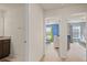 Hallway view of two bedrooms and a shared bathroom at 1627 Kona Ln, Davenport, FL 33897