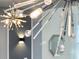 Close-up of a modern, multi-light fixture at 1627 Kona Ln, Davenport, FL 33897