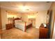 Bright bedroom with a wooden bed frame and tiled flooring at 2214 Winnetka Ct, Orlando, FL 32818