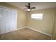 Bedroom with a double door closet and tile flooring at 2214 Winnetka Ct, Orlando, FL 32818