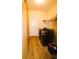 Laundry room with washer, dryer, and wood-look tile floor at 2214 Winnetka Ct, Orlando, FL 32818