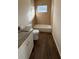 Updated bathroom with granite vanity, tub, and tile flooring at 314 N 6Th St, Haines City, FL 33844