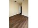 Bright bedroom with hardwood floors and ample closet space at 314 N 6Th St, Haines City, FL 33844
