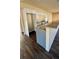Modern kitchen with granite countertops and white cabinetry at 314 N 6Th St, Haines City, FL 33844