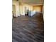Open concept living area showcasing a kitchen with an island and hardwood floors at 314 N 6Th St, Haines City, FL 33844