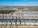 Aerial view of a community with numerous houses and pools at 4563 Narrative Ln, Kissimmee, FL 34746