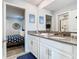 Modern bathroom with double vanity and a walk-in shower at 4563 Narrative Ln, Kissimmee, FL 34746