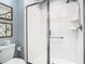 Bathroom with a shower and toilet at 4563 Narrative Ln, Kissimmee, FL 34746