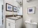 Modern bathroom with a single sink and updated fixtures at 4563 Narrative Ln, Kissimmee, FL 34746