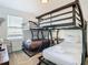 Bedroom with a bunk bed and plenty of space for  at 4563 Narrative Ln, Kissimmee, FL 34746