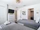 Bedroom with twin beds and a dresser at 4563 Narrative Ln, Kissimmee, FL 34746