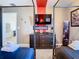 Bedroom with twin beds, a TV, and a dresser at 4563 Narrative Ln, Kissimmee, FL 34746