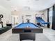 Game room with pool table and basketball game at 4563 Narrative Ln, Kissimmee, FL 34746