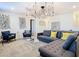 Game room with sectional sofa and stylish decor at 4563 Narrative Ln, Kissimmee, FL 34746
