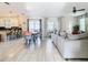 Open living area with large sofa and lots of natural light at 4563 Narrative Ln, Kissimmee, FL 34746