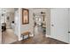 Bright entryway with hardwood floors and access to living spaces at 7573 Laureate Blvd # 1207, Orlando, FL 32827