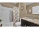 Clean bathroom with a shower/tub combo, toilet and vanity at 1823 Laredo Dr, Deltona, FL 32738