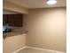 Small dining area with neutral walls and view of kitchen at 327 Scottsdale Sq # 327, Winter Park, FL 32792