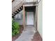 Exterior view of condo unit with private entrance and stairs at 347 Scottsdale Sq # 347, Winter Park, FL 32792