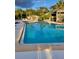 Community pool with surrounding patio at 347 Scottsdale Sq # 347, Winter Park, FL 32792