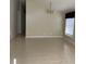 Spacious living room with tile floors and a high ceiling at 5453 Shingle Creek Dr, Orlando, FL 32821